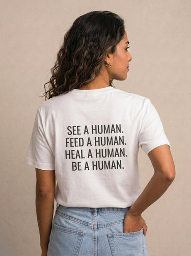 Back view of A HUMAN™ white unisex signature T-shirt featuring the full A HUMAN™ message.
