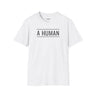 A HUMAN™ white signature t-shirt Full Message Edition flat lay front view with black A HUMAN boxed logo centered on chest, white background